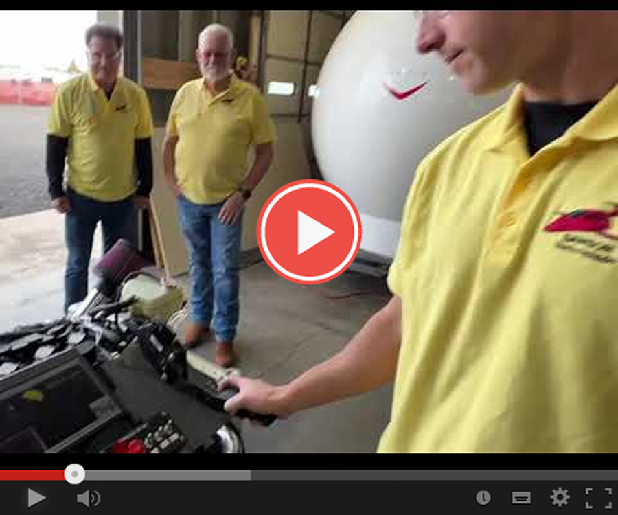 Global Innovator Award Presented to Sam Bousfield on Capitol Hill, A group of men standing around a machine