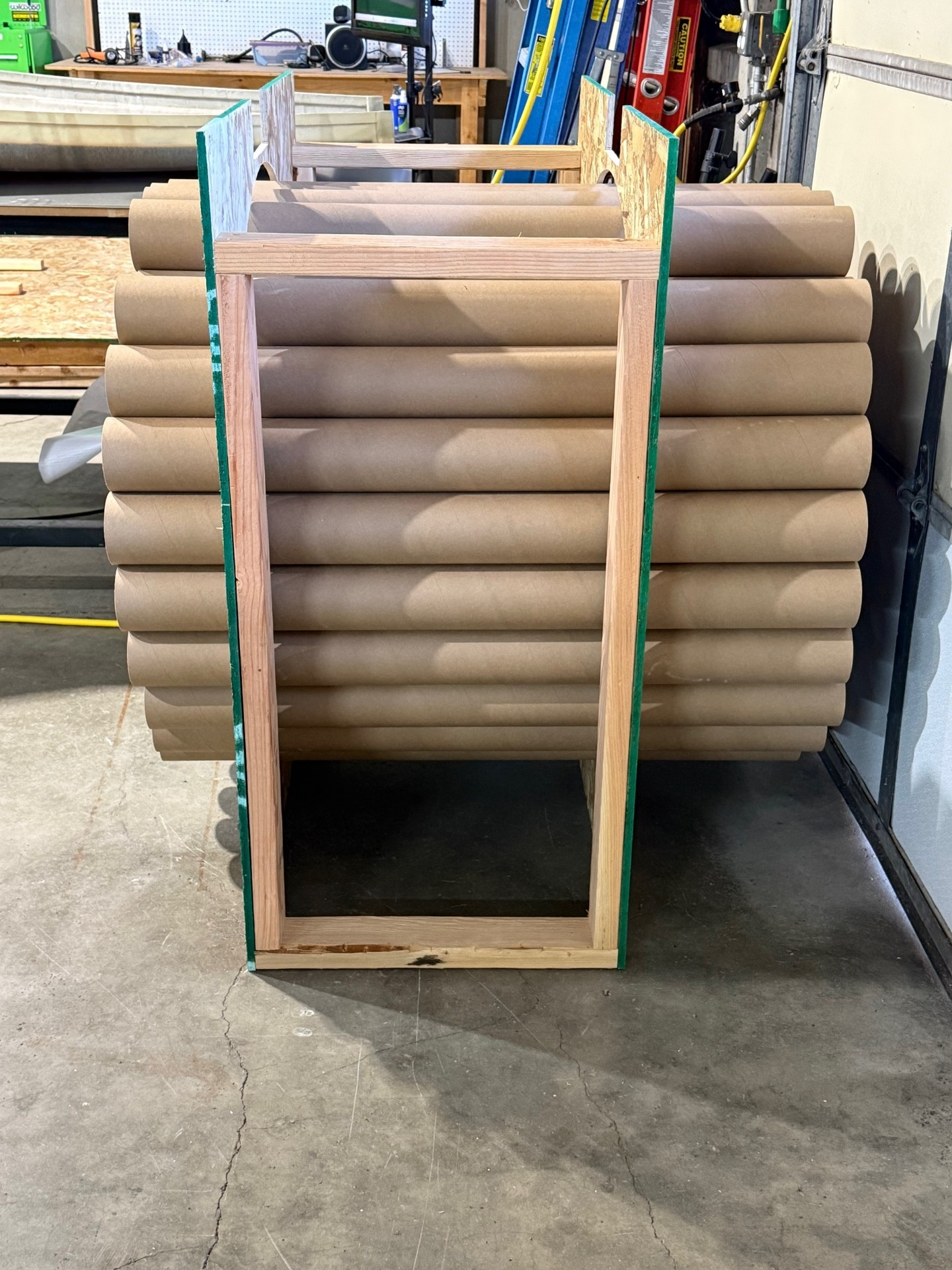 Piece of a flying sports car in a workshop