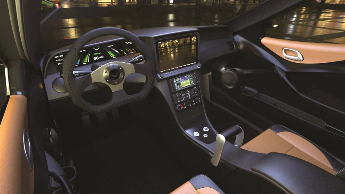 Interior view of a modern sports car cockpit with a digital dashboard, large infotainment screen, and tan leather seats.